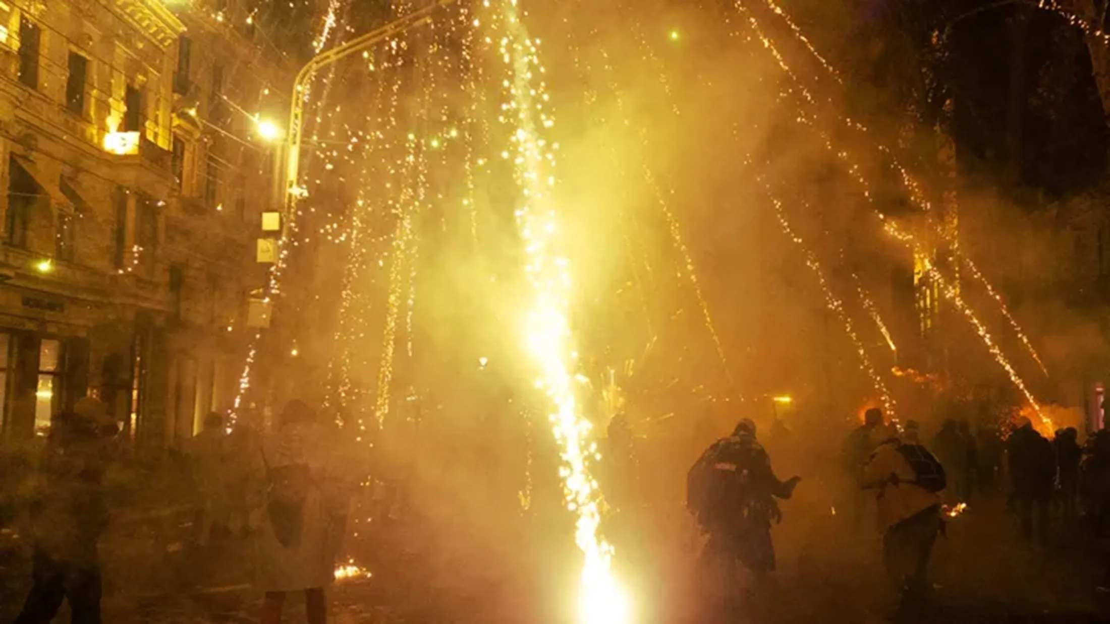 Protesters in Tbilisi using fireworks against riot police